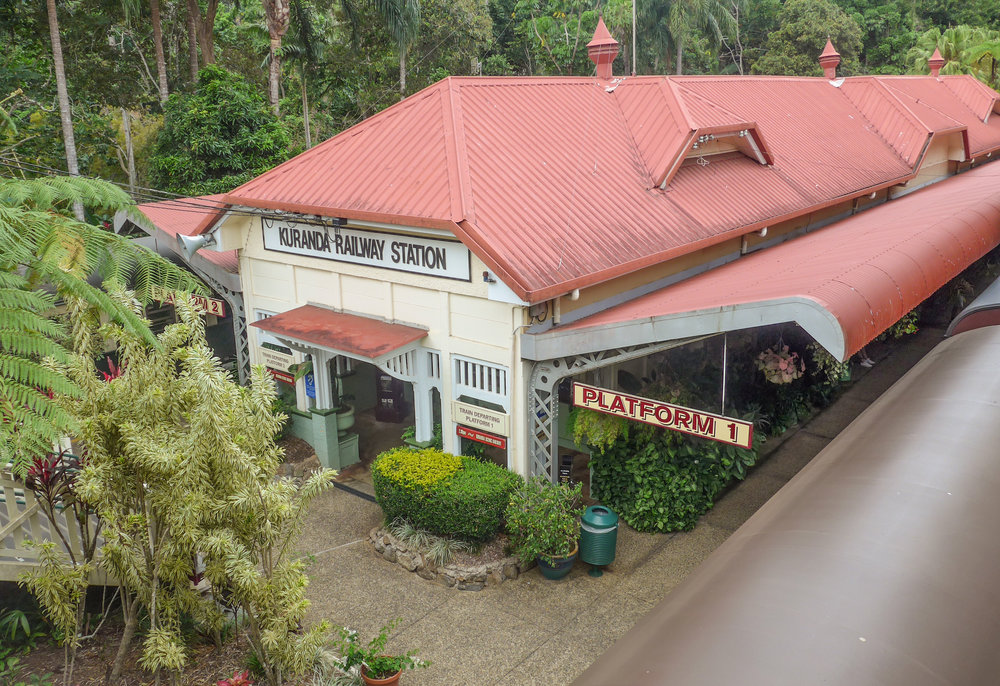 Above and below: Kuranda railway station and train underway